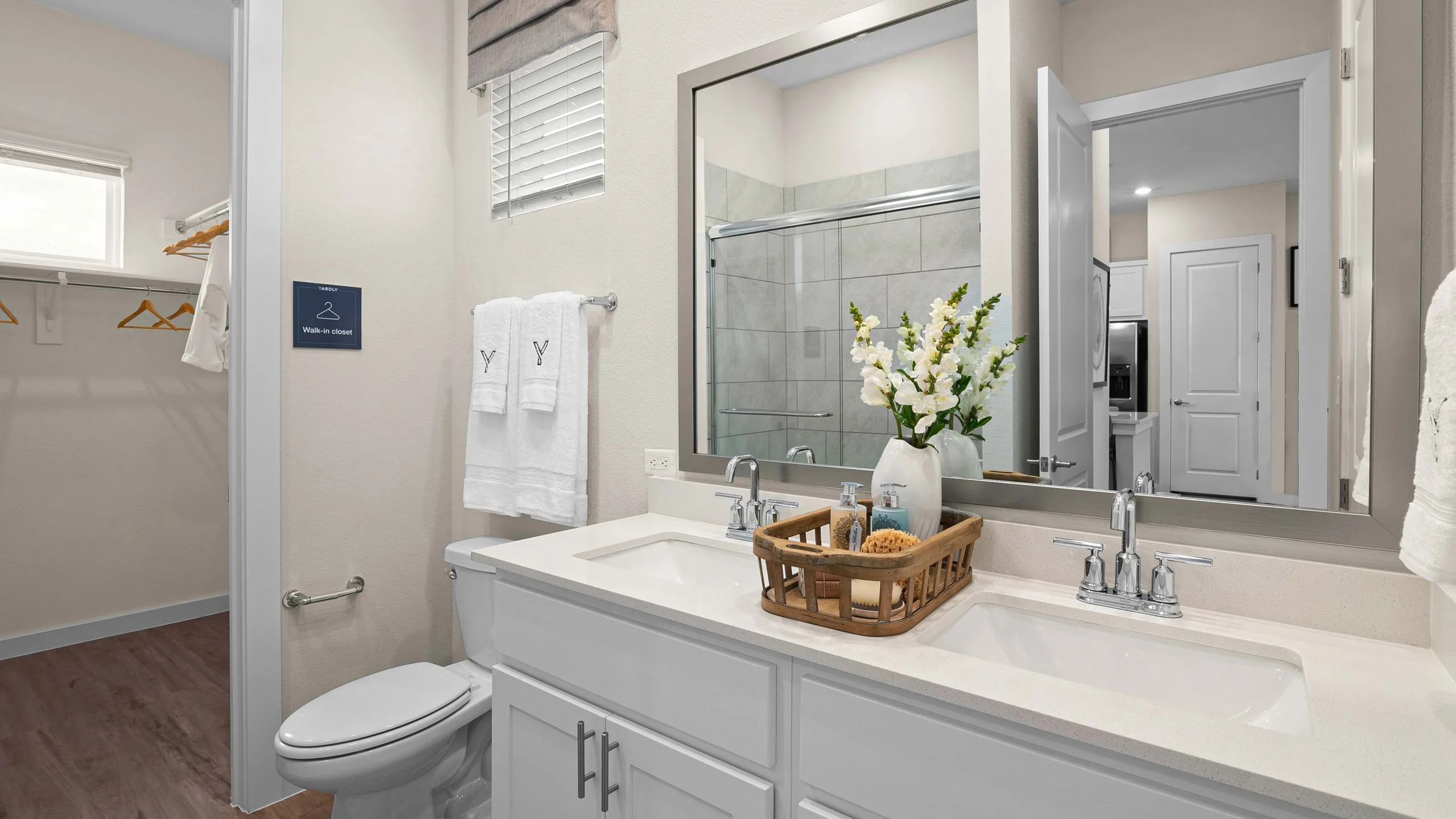Primary bathroom with a walk-in closet in a 1-bedroom pet friendly home for rent with private backyard and doggy door in Cypress, Tx.